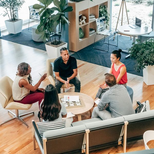 Person working at a modern desk feeling refreshed and focused.